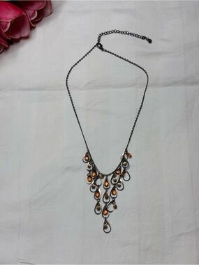 Vintage Style Amber
Faceted Glass & Olive Bead Drop
Waterfall Bib Necklace